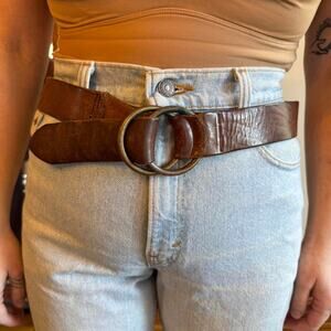 Brown leather belt with brass hardware